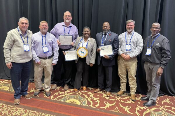 Receiving awards on behalf of the MWA during the GAWP Fall Conference included (left to right): Michel Wanna, Chris Monile, Darryl Macy, Mickie Sanders, Jamie Coverson, Chad Copeland, and Ron Shipman.