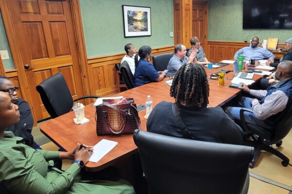 MWA staff meeting to plan the upcoming Kids Fishing Derby.