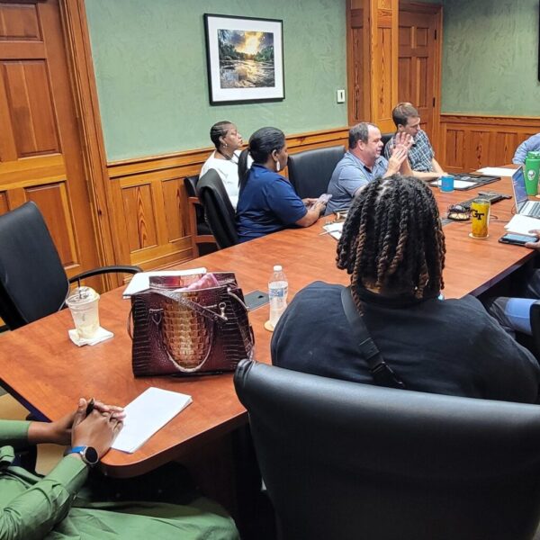 MWA staff meeting to plan the upcoming Kids Fishing Derby.